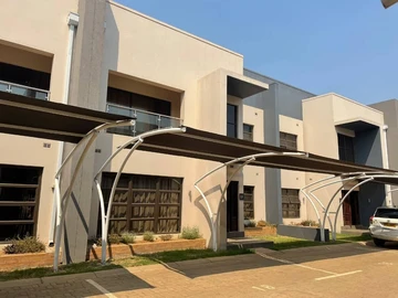 Modern duplex flat in an upmarket gated community with 3 bedrooms all ensuite, lounge ,dining and fi