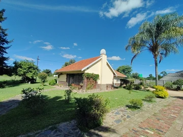 Newton West land and a family home