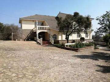 Portuguese Style Home with Lots of Potential.