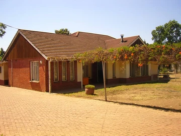 Solid property located along Harare Drive, suitable for commercial use.