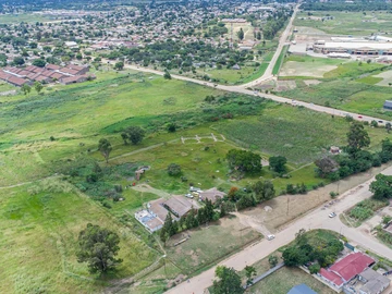 A big piece of land designated with intention to build shopping mall & leisure centre.