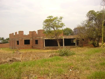 Incomplete Double-Storey House on Corner Stand