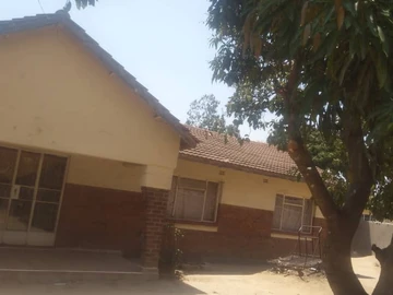 Chitungwiza Unit B  8 roomed house for sale with deeds